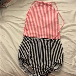 Kortni Jeane pink and black two piece bathing suit